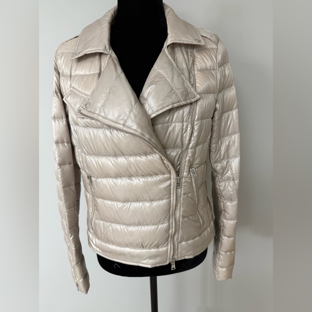 Herno Women's champagne/taupe Puffer Jacket currently retails for 928.00